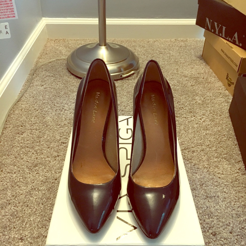 Metallic navy blue leather pumps. Size 7.5.